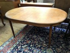 A G Plan oak extendable table, with rounded and crossbanded edges, with magic leaf mechanism, on