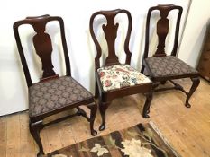 A late 18thc/early 19thc mahogany side chair, with dished top rail above a baluster splat, with a