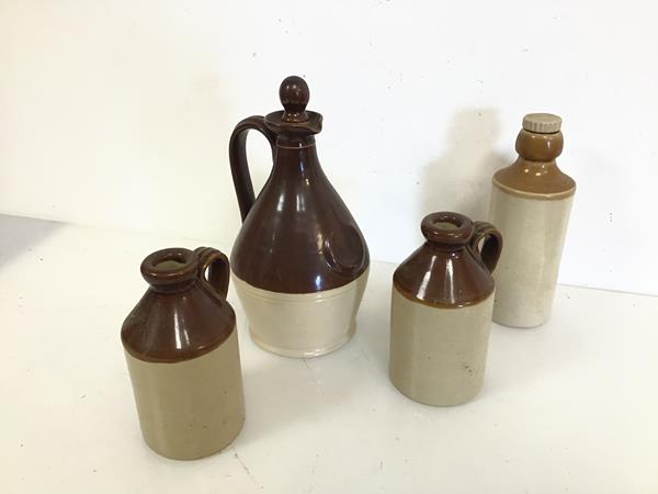 A pair of glazed stoneware bottles with handles, both stamped Pearsons, Chesterfield, est 1810 to
