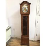 A modern mahogany grandmother clock with dome top, face panel marked, WM Widdop, complete with