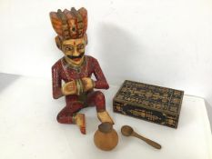 A carved wooden figure of a Seated Prince (h.32cm x 21cm x 18cm), an ebonised and marquetry box