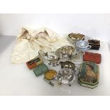 A mixed lot including an Epns sauceboat, a milk jug, swing handle basket and c.1950s tin boxes, a