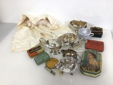 A mixed lot including an Epns sauceboat, a milk jug, swing handle basket and c.1950s tin boxes, a