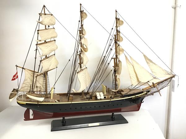 A model of a three masted tall ship on stand, stand bearing plaque, Georg Stage II, ship bearing
