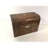 A 19thc walnut and parquetry tea caddy, the fitted interior with two fabric lined recesses, both