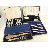 A mixed lot including a set of six butter knives with Sheffield silver handles, in original box,