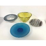 A collection of Studio Glass including a blue footed plate (d.26cm), a bowl with wide rim, a