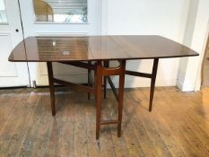 A mid century mahogany gateleg dining table with slightly eliptical top (76cm x open: 148cm x 84cm)