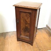 A 19thc mahogany and walnut bedside cabinet with single shelf to interior, on bracket feet (76cm x