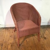 A Lloyd Loom Lusty chair in dusty pink (69cm x 53cm x 54cm)