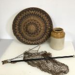 A mixed lot including a foldable fishing net, a South East Asian woven hat (d.44cm) and a