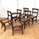 A set of six Scottish Regency stained beech chairs, c.1820, each slightly curved top rail incised