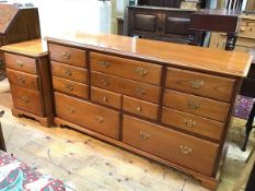 A modern chest of drawers with an arrangement of nine drawers, stamped Younger, Furniture to