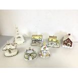 A collection of Coalport bone china houses, including The American Church (22cm x 15cm x 12cm) (a/