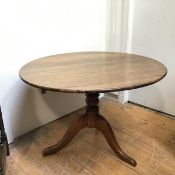 A late 18thc/early 19thc. mahogany tilt top table with moulded column support on tripod base (71cm x