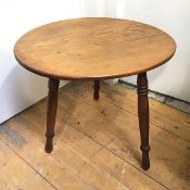 An unusual late 19thc/early 20thc. occasional table with oval pine top on turned mahogany