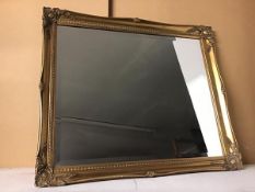 A modern bevelled glass mirror with gilt composition frame (60cm x 70cm)