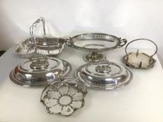 An assortment of Epns including a Walker & Hall swing handled pierced basket, two lidded serving