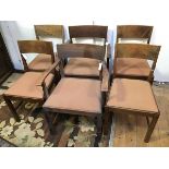 A set of six 1930s/40s oak dining chairs, two carvers and four side chairs with faded chocolate