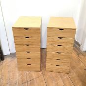 A pair of small chests of drawers each fitted six drawers (68cm x 32cm x 42cm)