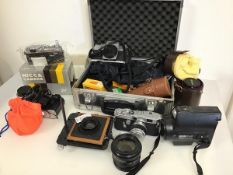 A large assortment of photography equipment including a Samuri 4.0 (13cm x 15cm x 9cm), a Nicca 3-F,
