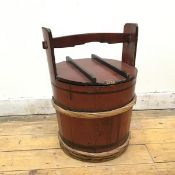 A Japanese red lacquered pail with handle above a removable lid (48cm x 34cm)