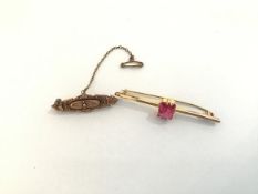 A Victorian Chester hallmarked 9ct gold bar brooch with wirework decoration, together with a bar