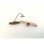A Victorian Chester hallmarked 9ct gold bar brooch with wirework decoration, together with a bar