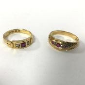 An 18ct gold ring set with three rubies divided by diamonds (R) and an 18ct gold ring set central
