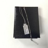 An 18ct white gold four row rectangular diamond set pendant on box chain with forty five baguette