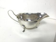 A 1930s Birmingham silver sauceboat, inscribed Wilson & Sharp Ltd., Edinburgh to base (7cm x 15cm