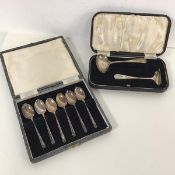A boxed set of six Sheffield silver teaspoons, a presentation baby spoon and table scrape (combined: