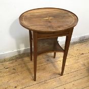 An Edwardian occasional table, the oval top with inlay and raised edge above a single frieze