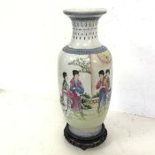 A Republic period Chinese vase, depicting Four Women in a Garden, with Chinese script verso and four