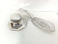 A 1930s Capstan style inkwell (5.5cm x 12cm) (without glass insert: 299.27g) and an Epns fish