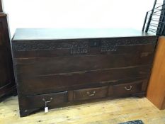 A large early 18thc oak mule chest, with likely later top and hinges above a moulded frieze of