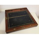 A 19thc mahogany travelling writing slope with fitted interior and tooled leather writing surface (