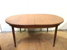 A G Plan oak extendable table with rounded and crossbanded edges, with magic leaf mechanism, on