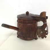 An 18thc Swedish wooden long spout ale tankard, with hinged lid on carved handle and spout to one