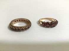 A 9ct gold garnet full hoop eternity ring, stamped marks, together with a five stone garnet ring,