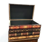 A decorative box in the form of horizontally stacked books, with hinged top (31cm x 52cm x 32cm)