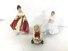 A Royal Doulton figure, Southern Belle, stamped to base (19cm), another, Heather and a Paragon
