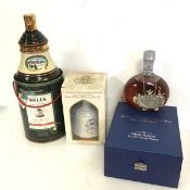 A group of Scotch whiskies including Bells Christmas 1989 (porcelain decanter), White & Mackay,