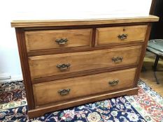 A c.1900 birch chest of drawers, the top with channelled edges above two short drawers and three