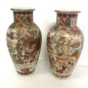 A pair of 1920s/30s Satsuma baluster shaped vases, both depicting Three Men instructing a Child (