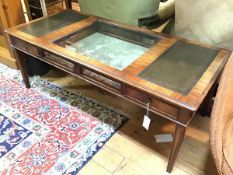 A reproduction mahogany Georgian style display table, the central glass top flanked by two tooled