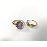 A 9ct gold ring set baguette amethyst (K) and another 9ct gold ring set green stone with surround of