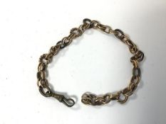 A yellow metal and metal link chain bracelet, possibly made up of associated chains (11cm) (21.91g)