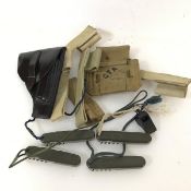 A mixed lot including five Enfield canvas frogs, WWII webbing pouch, dated 1942, four German post-