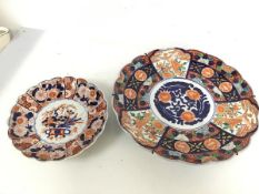A large 1930s/40s Imari charger with scalloped edge (6cm x 38cm) and another smaller Imari charger